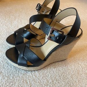 Michael Kors black wedges. Like brand new condition; worn once